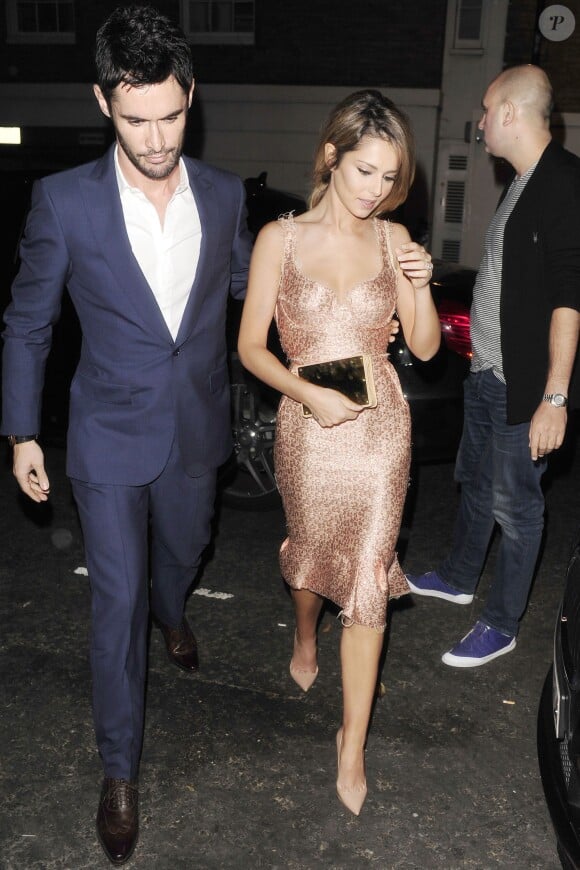 Cheryl Cole et son époux Jean-Bernard Fernandez-Versini quittent le Scalini, un restaurant italien où Simon Cowell a organisé son 54e anniversaire, à Londres le 22 septembre 2014.
