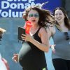 Exclusif - Mila Kunis enceinte quitte son cours de Yoga à Los Angeles le 16 septembre 2014.