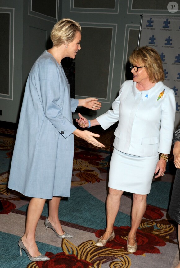 La princesse Charlene de Monaco, enceinte de près de 7 mois, lors du 7e Forum mondial sur l'autisme à New York le 25 septembre 2014