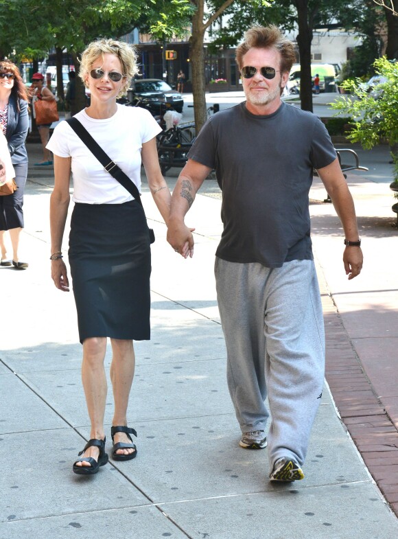 Meg Ryan et John Mellencamp à New York le 24 juin 2013. L'actrice et le rockeur, en couple depuis fin 2010, se sont séparés en 2014.