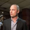 Carl Pistorius, frère d'Oscar Pistorius arrivant au tribunal de Pretoria, le 19 février 2013.