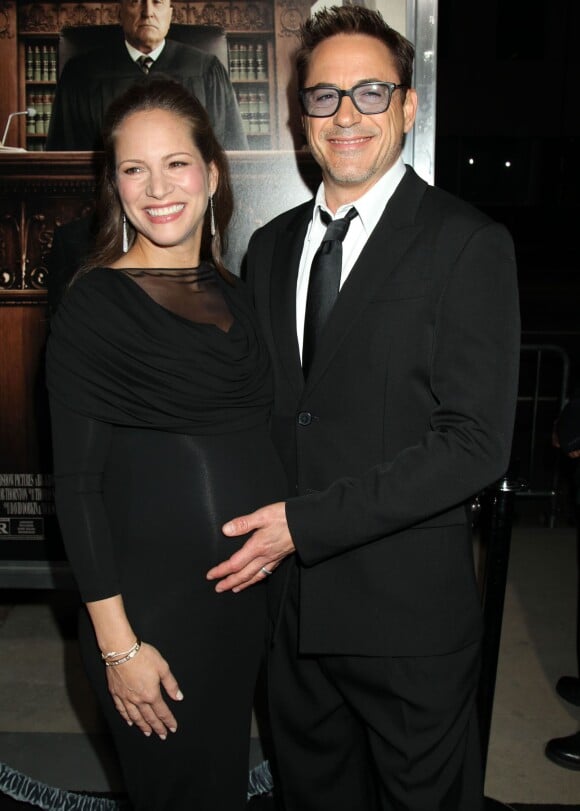 L'acteur Robert Downey Jr et sa femme Susan Downey, enceinte, à la première de "The Judge" à Beverly Hills, le 1er octobre 2014.