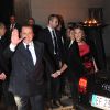 Silvio Berlusconi et sa compagne Francesca Pascale à la sortie du mariage de Michelle Hunziker et Tomaso Trussardi à Bergame, le 10 octobre 2014