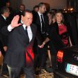 Silvio Berlusconi et sa compagne Francesca Pascale à la sortie du mariage de Michelle Hunziker et Tomaso Trussardi à Bergame, le 10 octobre 2014