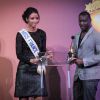 Flora Coquerel (Miss France 2014) et Ladji Doucouré remettent le prix de Meilleur Artiste lors des Trace Urban Music Awards 2014 au Casino de Paris. Le 22 octobre 2014.