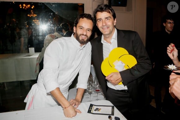Exclusif - Yoni Saada (Top Chef 2013) et Yannick Alléno lors de la soirée de lancement du guide Gault et Millau 2015 au Trianon à Paris le 27 octobre 2014