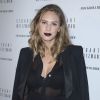 Dylan Penn (fille de Sean Penn) lors du photocall de la soirée Stuart Weitzman à l’hôtel Salomon de Rothschild à Paris, le 29 septembre 2014. 