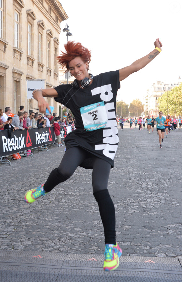 Fauve Hautot - Course "La Parisienne 2014" pour la lutte contre le cancer, au Champs de Mars à Paris, le 14 septembre 2014.