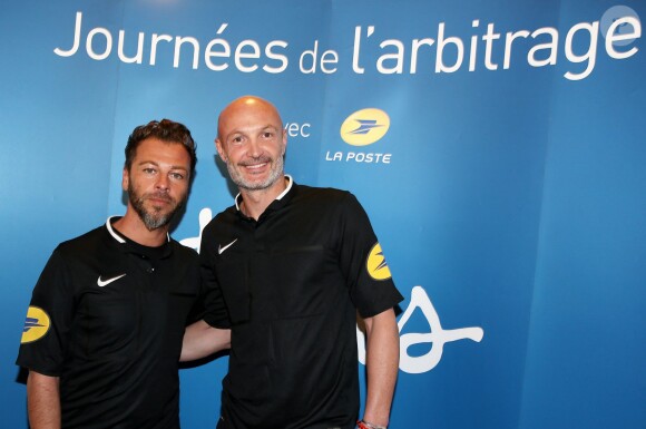 Christophe Maé et Frank Leboeuf lors des 13e Journées de l'arbitrage au stade Emile Anthoine, à Paris le 30 octobre 2014