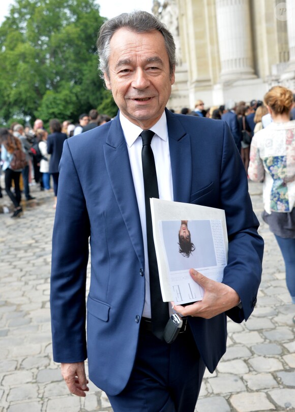 Michel Denisot lors de l'arrivée des people au défilé de mode Chanel Haute Couture Automne-Hiver 2014/2015 au Grand Palais à Paris, le 8 juillet 2014