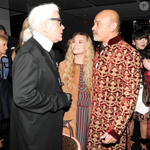 Karl Lagerfeld, Ashley Olsen et Christian Louboutin assistent au dîner "Louis Vuitton celebrating Monogram" organisé par Louis Vuitton au MoMA. New York, le 7 novembre 2014.