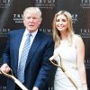 Donald Trump et Ivanka Trump posent la première pierre du Trump International Hotel à Washington, le 24 juillet 2014.