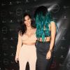 Kim Kardashian soutient sa demi-soeur Kylie Jenner en assistant à la soirée de lancement de sa ligne d'extensions capillaires, Kylie Hair Kouture. Beverly Hills, le 13 novembre 2014.