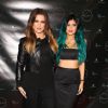 Khloé Kardashian soutient sa demi-soeur Kylie Jenner en assistant à la soirée de lancement de sa ligne d'extensions capillaires, Kylie Hair Kouture. Beverly Hills, le 13 novembre 2014.