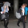 Charlize Theron et Sean Penn arrivent à l'aéroport de LAX à Los Angeles. Le 10 novembre 2014.