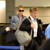 Charlize Theron et Sean Penn à l'aéroport LAX à Los Angeles, le 10 novembre 2014.