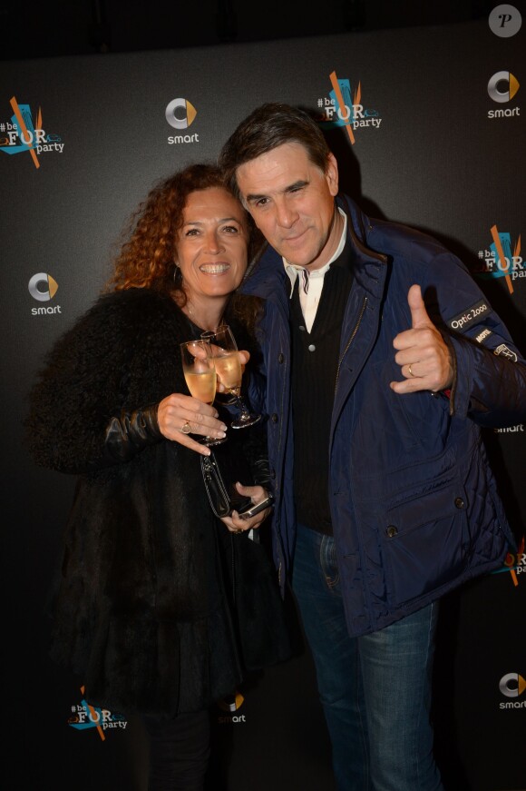 Tex et sa femme Béatrice - Soirée de lancement des Smart ForTwo et ForFour au Centre national d'art et de culture Georges-Pompidou à Paris le 18 novembre 2014.