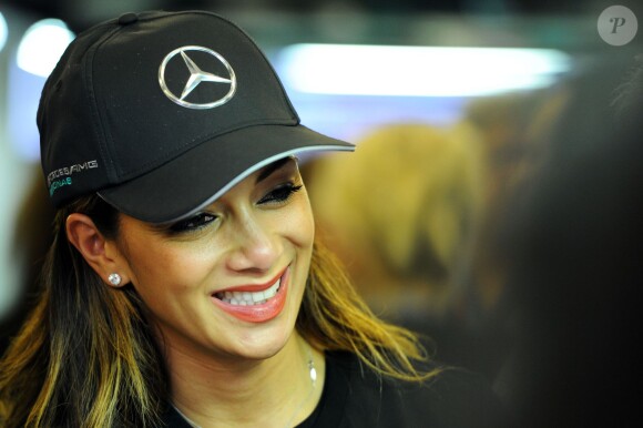 Nicole Scherzinger, heureuse après le titre de champion du monde décroché par Lewis Hamilton lors du dernier Grand Prix de la saison de F1 à Abou Dhabi, le 23 novembre 2014