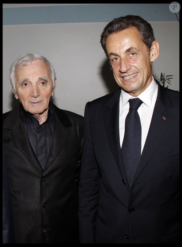 Charles Aznavour et Nicolas Sarkozy, à l'Olympia, le 28 septembre 2011