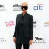 Amber Rose et ses lunettes de soleil Moncleur Lunettes feat. Pharrell Williams assistent aux Billboard Music Awards 2014 à Las Vegas. Le 18 mai 2014.