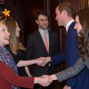 Kate Middleton, la duchesse de Cambridge, enceinte et le prince William lors d'une réception avec Hillary Clinton et sa fille Chelsea, au Consulat Britannique à New York, le 8 décembre 2014, 2ème jour de la visite officielle du couple aux Etats-Unis.