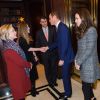 Kate Middleton, la duchesse de Cambridge, enceinte et le prince William lors d'une réception avec Hillary Clinton et sa fille Chelsea, au Consulat Britannique à New York, le 8 décembre 2014, 2ème jour de la visite officielle du couple aux Etats-Unis. Cette réception est organisée par la "Royal Foundation" et la "Clinton Foundation", consacrée à la faune sauvage.
