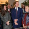 Kate Middleton, la duchesse de Cambridge, enceinte et le prince William lors d'une réception avec Hillary Clinton et sa fille Chelsea, au Consulat Britannique à New York, le 8 décembre 2014, 2ème jour de la visite officielle du couple aux Etats-Unis. Cette réception est organisée par la "Royal Foundation" et la "Clinton Foundation", consacrée à la faune sauvage. 8 December 2014.