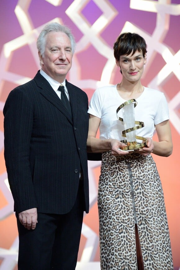Clotilde Hesme receives the best performance for an actress from Alan Rickman during the 14th Marrakech Film Festival closing ceremony in Marrakech, Morocco on December 13, 2014. Photo by Nicolas Briquet/ABACAPRESS.COM14/12/2014 - Marrakech
