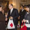 Le prince Albert II de Monaco lors de la traditionnelle remise de cadeaux aux seniors au siège de la Croix Rouge de Monaco le 16 décembre 2014.