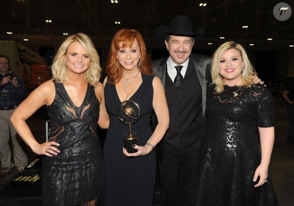 (L-R) Miranda Lambert, Reba McEntire, Kix Brooks, and Kelly Clarkson backstage the 2014 American Country Countdown Awards on FOX at the Music City Center on December 15, 2014 in Nashville, Tennessee, USA. Photo by Frank Micelotta/PictureGroup/ABACAPRESS.COM16/12/2014 - Nashville
