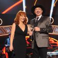 Kix Brooks presents Reba McEntire with the NASH Icon Award on the 2014 American Country Countdown Awards on FOX at the Music City Center on December 15, 2014 in Nashville, Tennessee, USA. Photo by Frank Micelotta/PictureGroup/ABACAPRESS.COM16/12/2014 - Nashville
