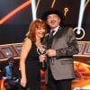 Kix Brooks presents Reba McEntire with the NASH Icon Award on the 2014 American Country Countdown Awards on FOX at the Music City Center on December 15, 2014 in Nashville, Tennessee, USA. Photo by Frank Micelotta/PictureGroup/ABACAPRESS.COM16/12/2014 - Nashville