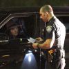 Exclusif - Kendall Jenner, au volant de son 4*4 Range Rover avec son amie Hailey Baldwin, se font interpeller par un agent de police pour excès de vitesse. Los Angeles, le 17 décembre 2014.