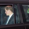 Le prince Harry arrivant le 17 décembre 2014 au déjeuner de Noël offert par la reine Elizabeth II à Buckingham Palace.