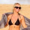 Pamela Anderson et son mari Rick Salomon à Hawaï, le 26 décembre 2014.