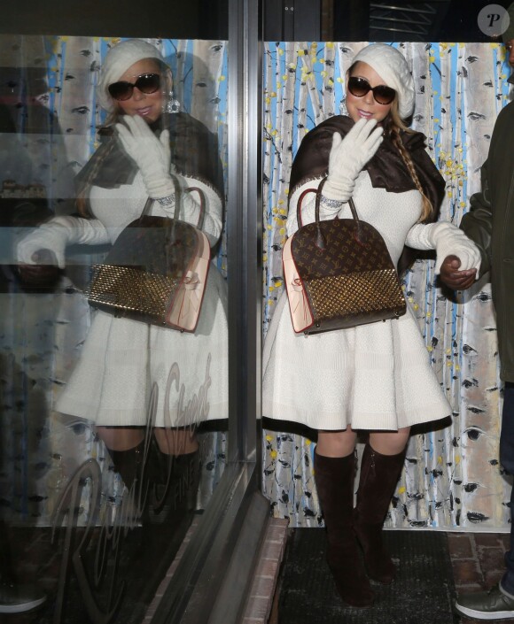 Mariah Carey fait du shopping chez Louis Vuitton à Aspen, le 27 décembre 2014.  