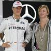Michael Schumacher et son attachée de presse Sabine Kehm à Sao Paulo au Brésil le 25 novembre 2012