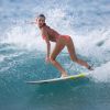 Chelsea Tuach surfe à la Barbade, le jeudi 1er janvier 2015.