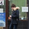 Liam Gallagher et sa compagne Debbie Gwyther se promènent dans les rues de Londres, le 6 janvier 2014. Le rockeur aurait présenté sa nouvelle amoureuse à sa mère durant les fêtes de Noël qu'il a passées à Manchester.