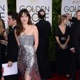 Dakota Johnson arrive à la 72e cérémonie des Golden Globe Awards à Beverly Hills, le 11 janvier 2015.