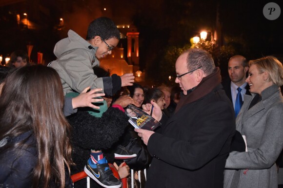 Le prince Albert II de Monaco et la princesse Charlene célébraient la Sainte Dévote, le 26 janvier 2015 sur le port Hercule. Ils ont embrasé ensemble la barque rappelant la légende de la martyre corse devenue sainte patronne de la principauté.