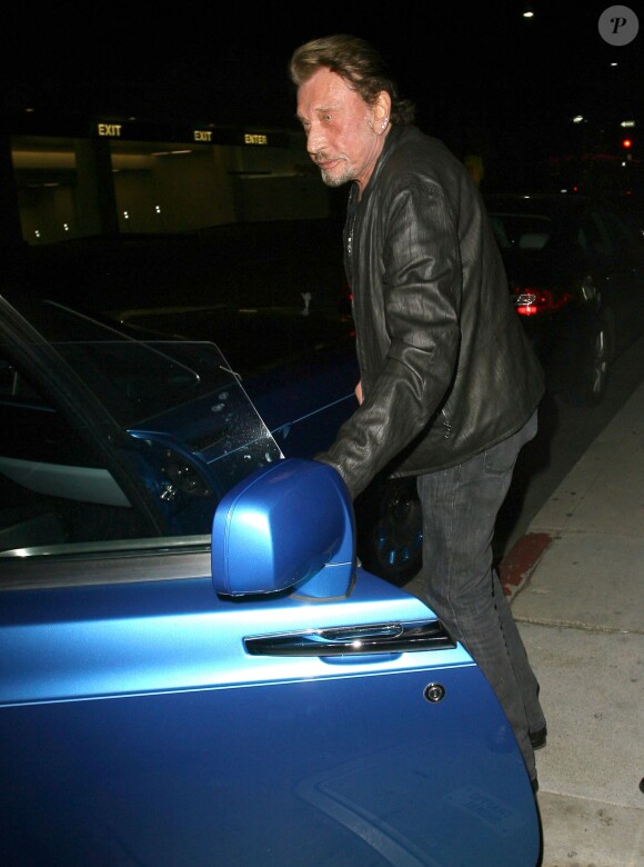 Johnny Hallyday sortant du restaurant Mr Chow à Los Angeles le 23 janvier 2015.