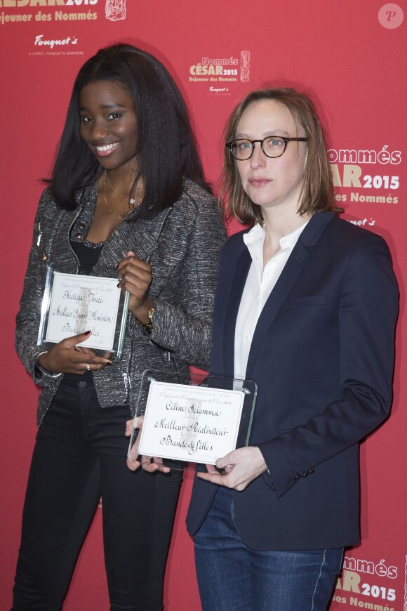 Karidja Touré, nommée dans la catégorie Meilleur Espoir Féminin dans le film "Bande de filles" et Céline Sciamma, nommée dans la catégorie Meilleur Réalisateur pour le film "Bande de filles" - Déjeuner des nommés aux César 2015 au Fouquet's à Paris, le 7 février 2015