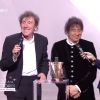 Alain Souchon et Alain Voulzy aux 30e Victoires de la musique, au Zénith de Paris, le 13 février 2015.