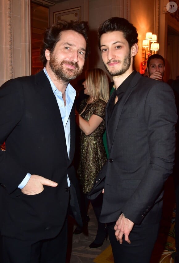 Edouard Baer et Pierre Niney - Dîner des producteurs et remise du prix "Daniel Toscan du Plantier" au Four Seasons Hotel George V à Paris le 16 février 2015.