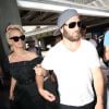 Pamela Anderson, attendue par de nombreux fans à qui elle a signé des autographes, arrive avec son mari Rick Salomon à l'aéroport de Nice pour le festival de Cannes. L'actrice et son mari se sont ensuite rendus à l'hôtel Eden Roc au Cap d'Antibes. Le 13 mai 2014