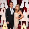 Justin Theroux et Jennifer Aniston (robe Atelier Versace) - 87e cérémonie des Oscars à Los Angeles le 22 février 2015