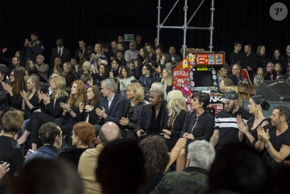 Amanda Seyfried, Xavier Niel, Delphine Arnault, Jessica Chastain, Isabelle Huppert, Bernard et Hélene Arnault, Kanye West, Kim Kardashian, Kris Jenner, Johnny Wujek et Katy Perry - People au défilé de mode Givenchy prêt-à-porter Automne-Hiver 2015-2016 à Paris le 8 mars 2015.