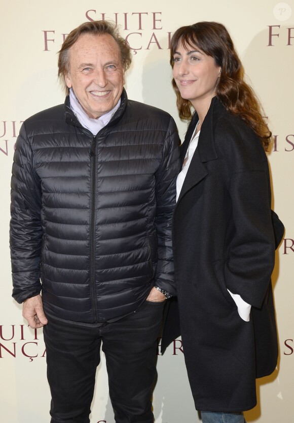 Alexandre Arcady et sa compagne Sabrina Guigui - Avant-première mondiale du film "Suite Française" à l'UGC Normandie à Paris, le 10 mars 2015.
