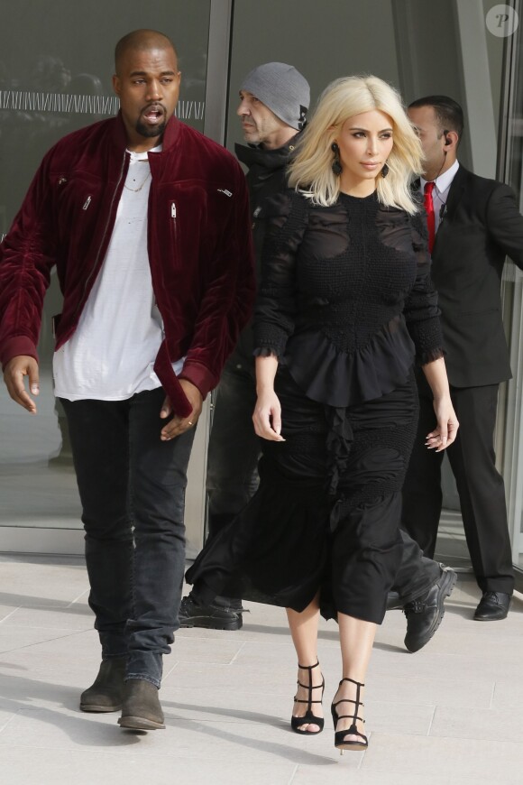 Kanye West et Kim Kardashian quittent la Fondation Louis Vuitton à l'issue du défilé Louis Vuitton automne-hiver 2015-2016. Paris, le 11 mars 2015.